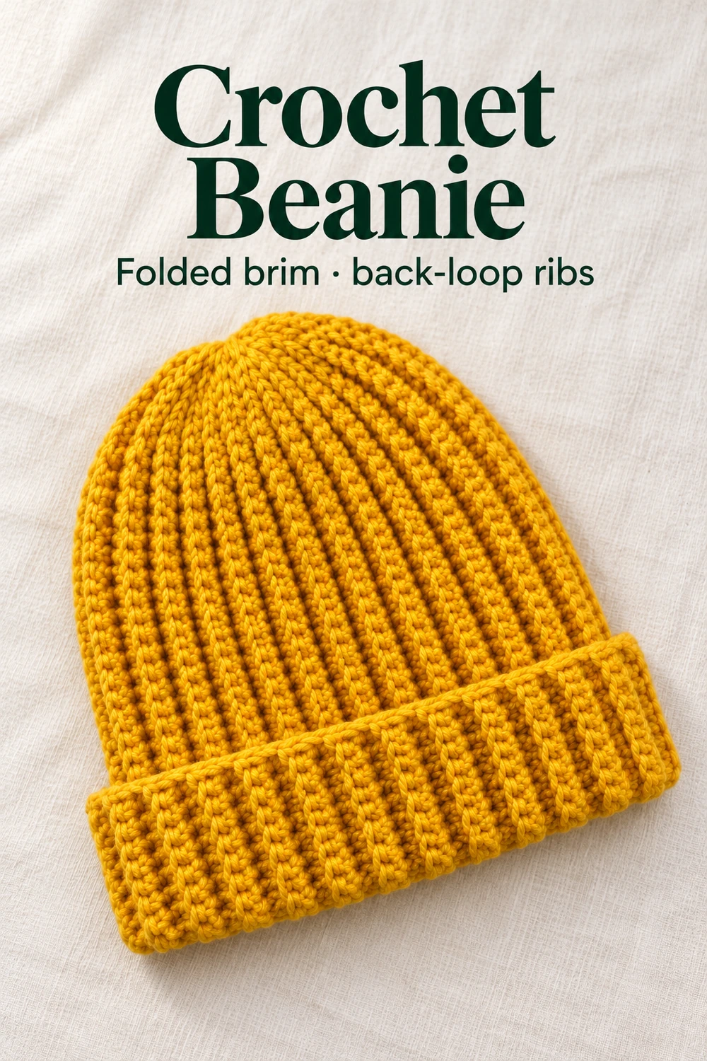 Mustard-yellow crochet beanie with a folded brim and vertical back-loop ribs