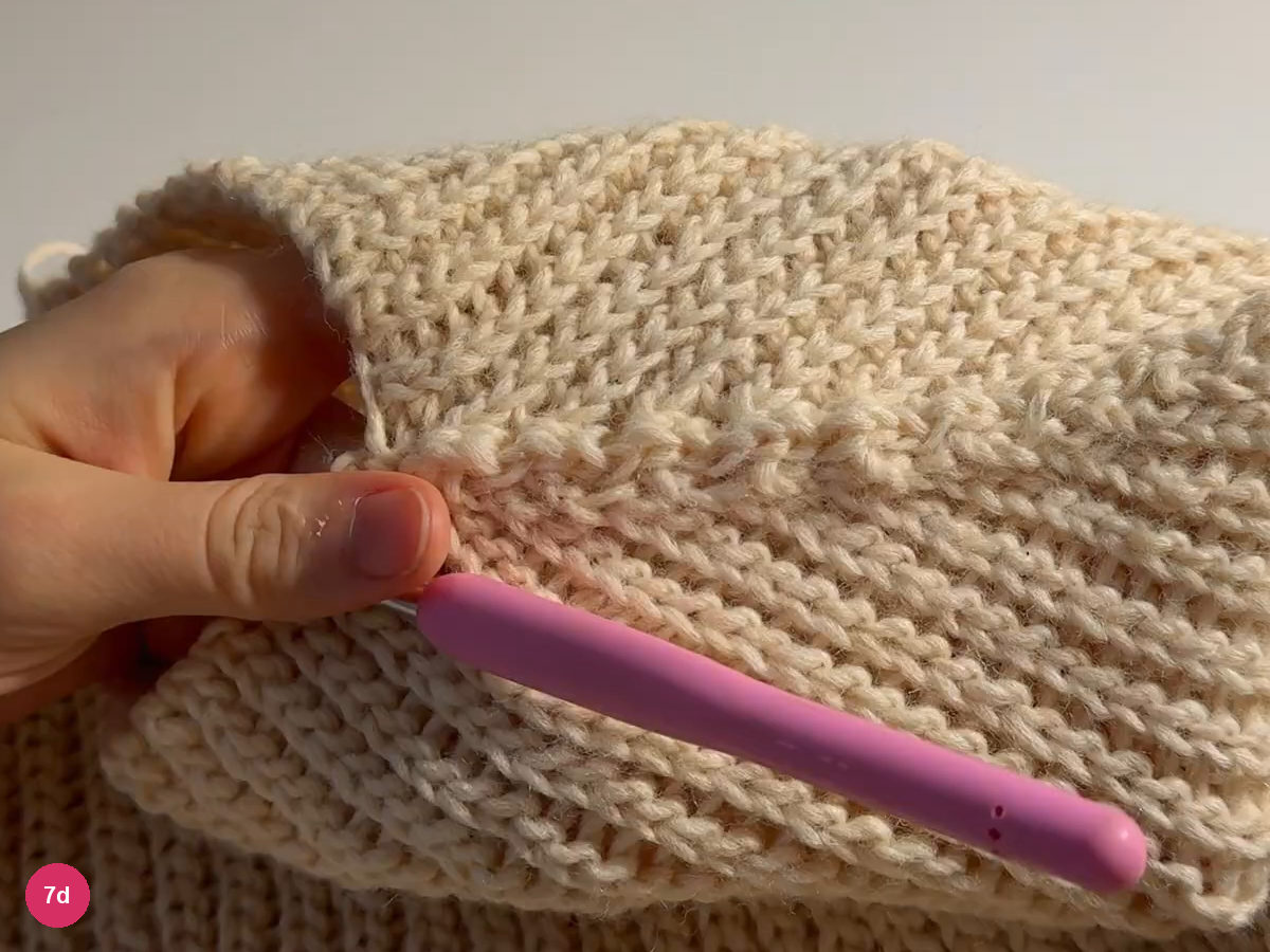 Joined cream crown opened to show the seam and surrounding ribbing