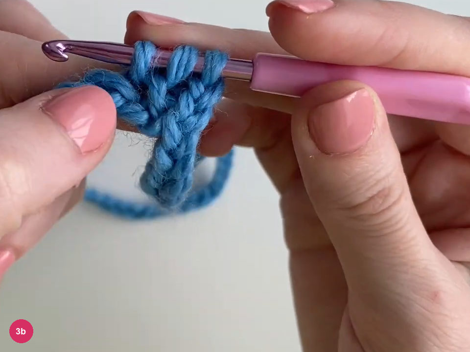 Three blue loops along the shaft of the purple hook