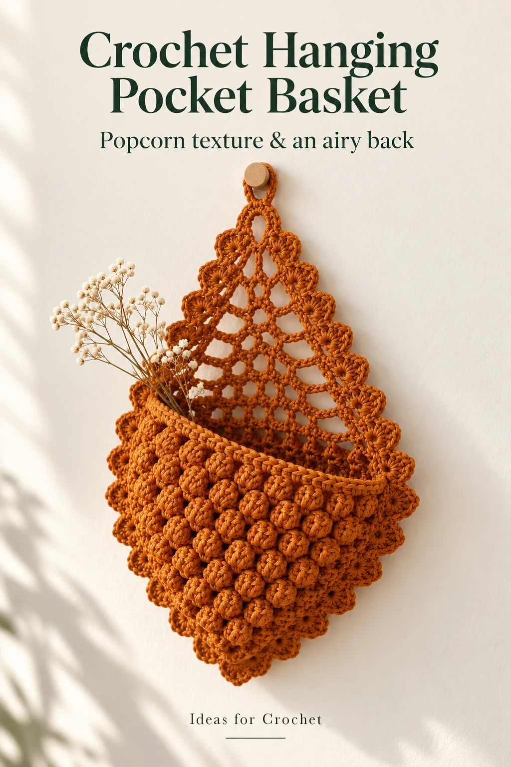 Mustard popcorn crochet hanging pocket basket with scalloped sides and an accurate project headline