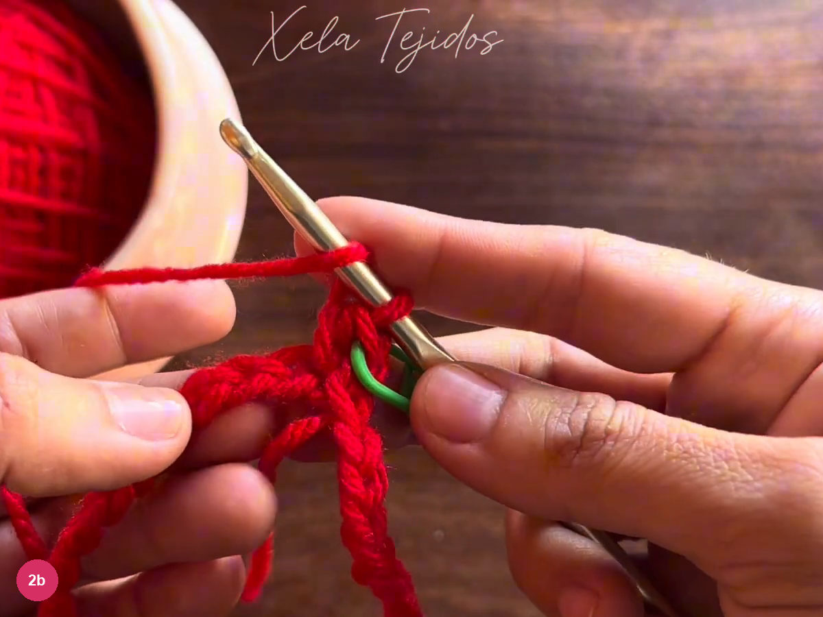 Green marker beside the first red half-double-crochet stitches