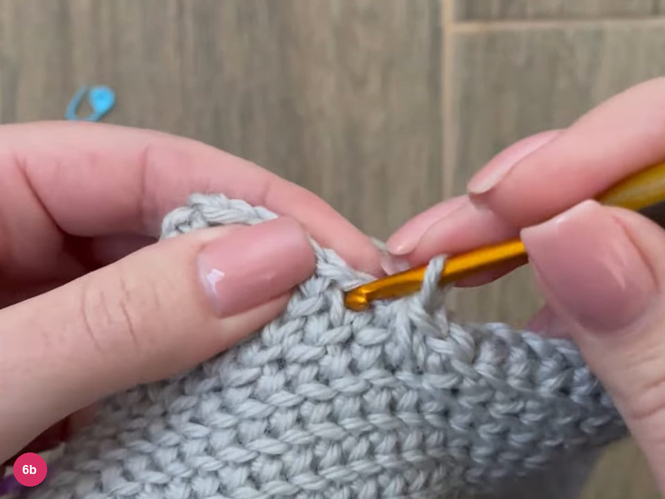 Hook working single crochet along the edge of the thumb opening