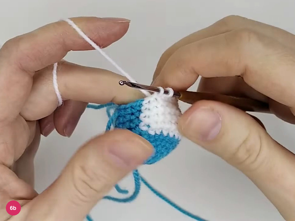 Hook at the end of the white front between the flippers