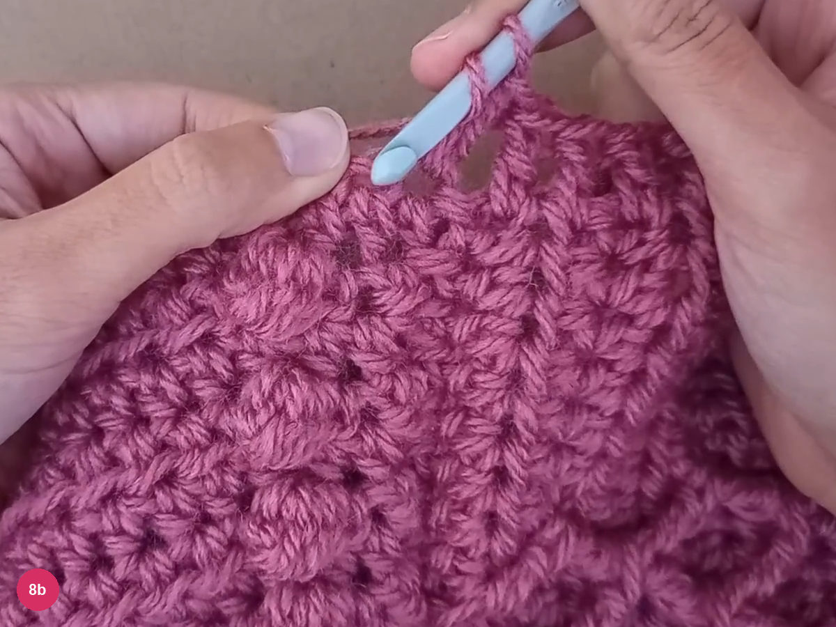 Hook and foundation loops exposed beside the new lower-edge stitches