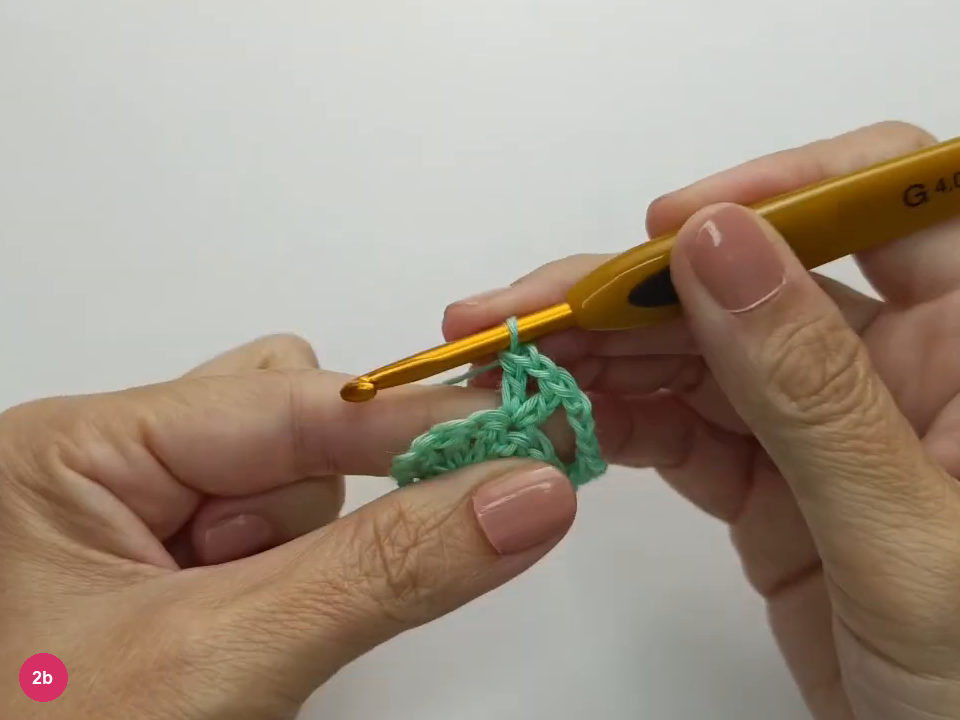 The central V-stitch is worked into the middle of the fan.
