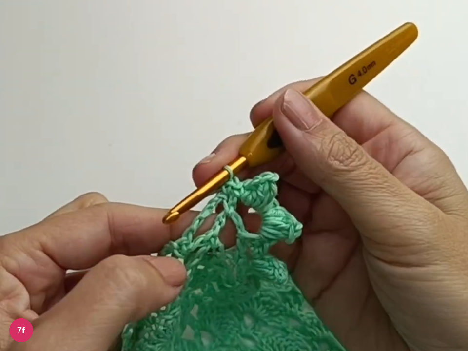 Two bobbles share the central arch to emphasize the point.