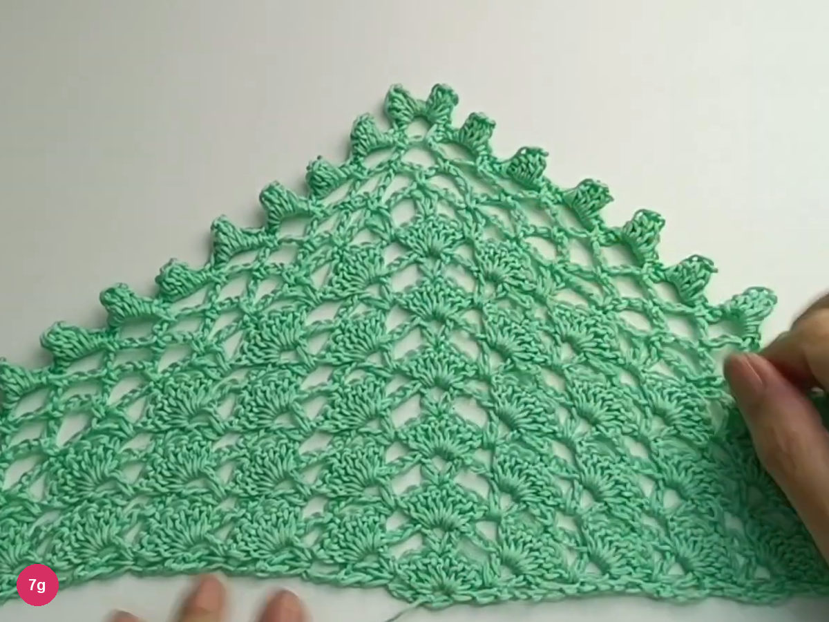 The finished sample has a pointed mesh border and raised crocheted bobbles.